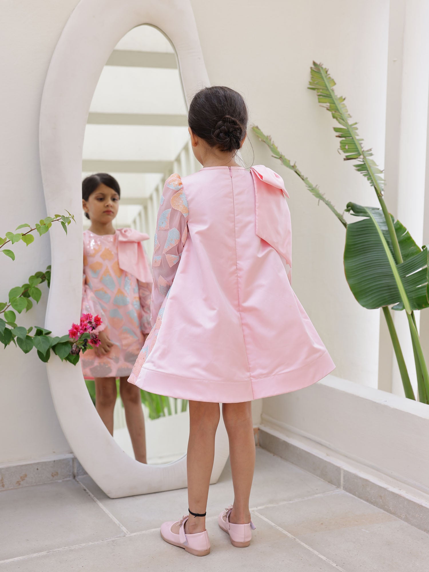 Unique Pink Cupcake Dress for girls: A-line cut and statement shoulder bow.