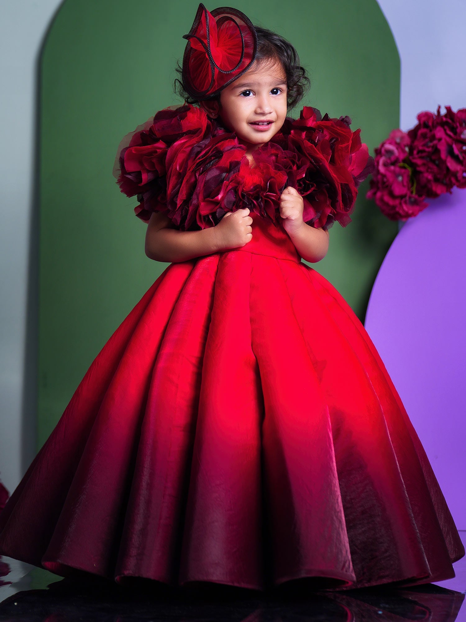 Shaded Red Couture Gown With Hair Accessory