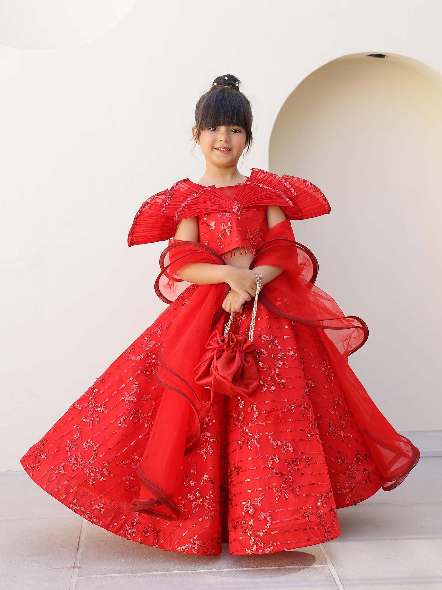 Sequin blouse with wired petal drape shoulders