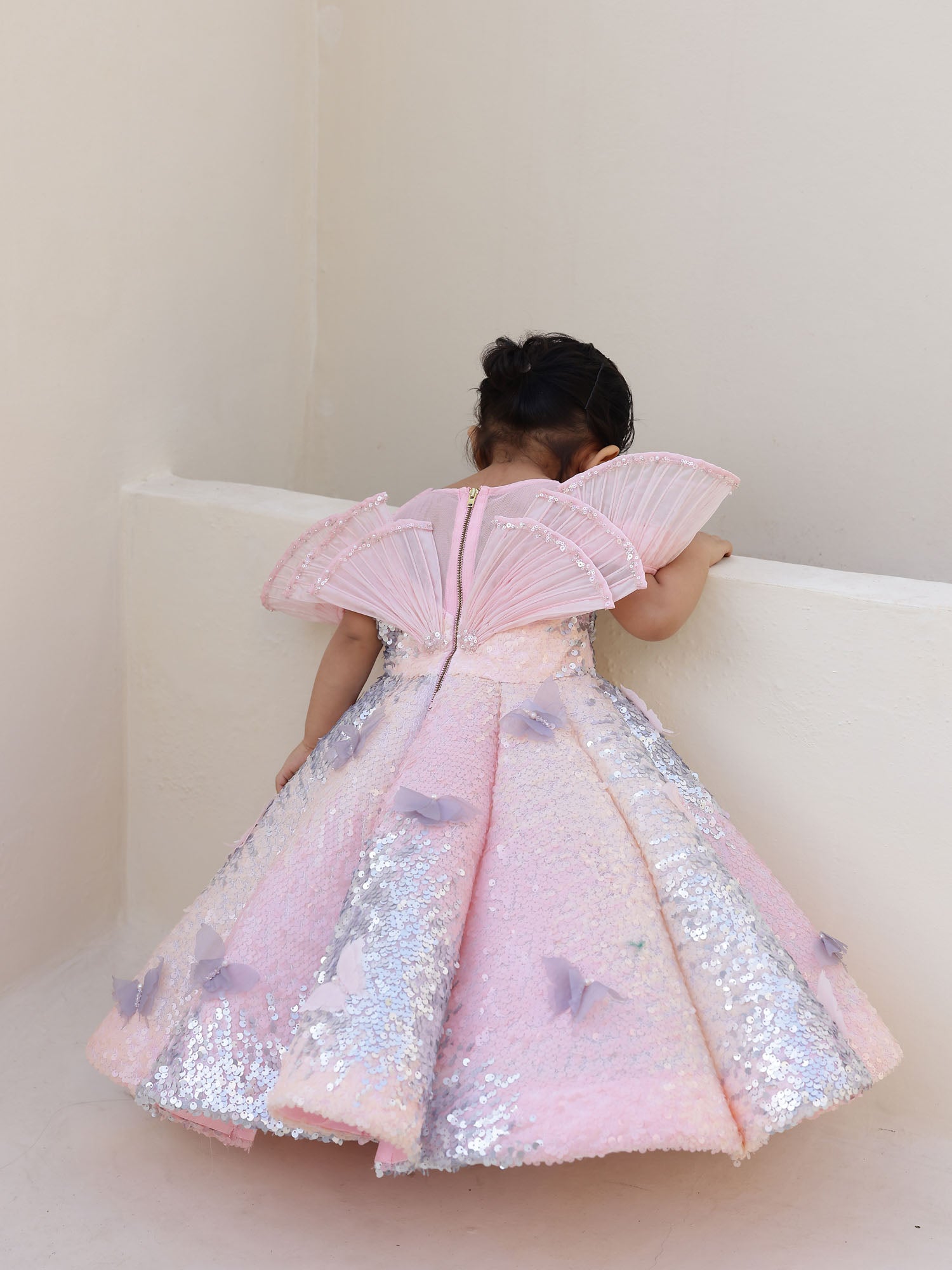 Pink ombre sequin gown with a dramatic wired neckline and butterfly appliqués—perfect for parties, carnivals, and birthday celebrations.